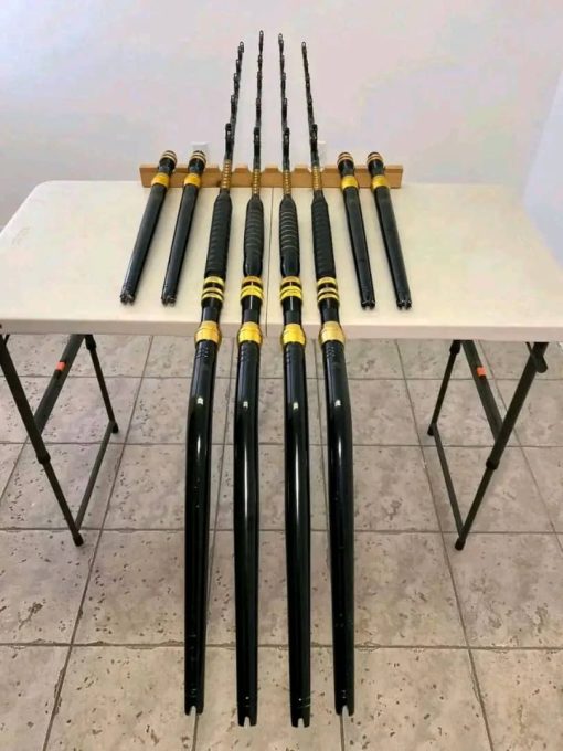 4 80lb Penn rods with rollers top to bottom